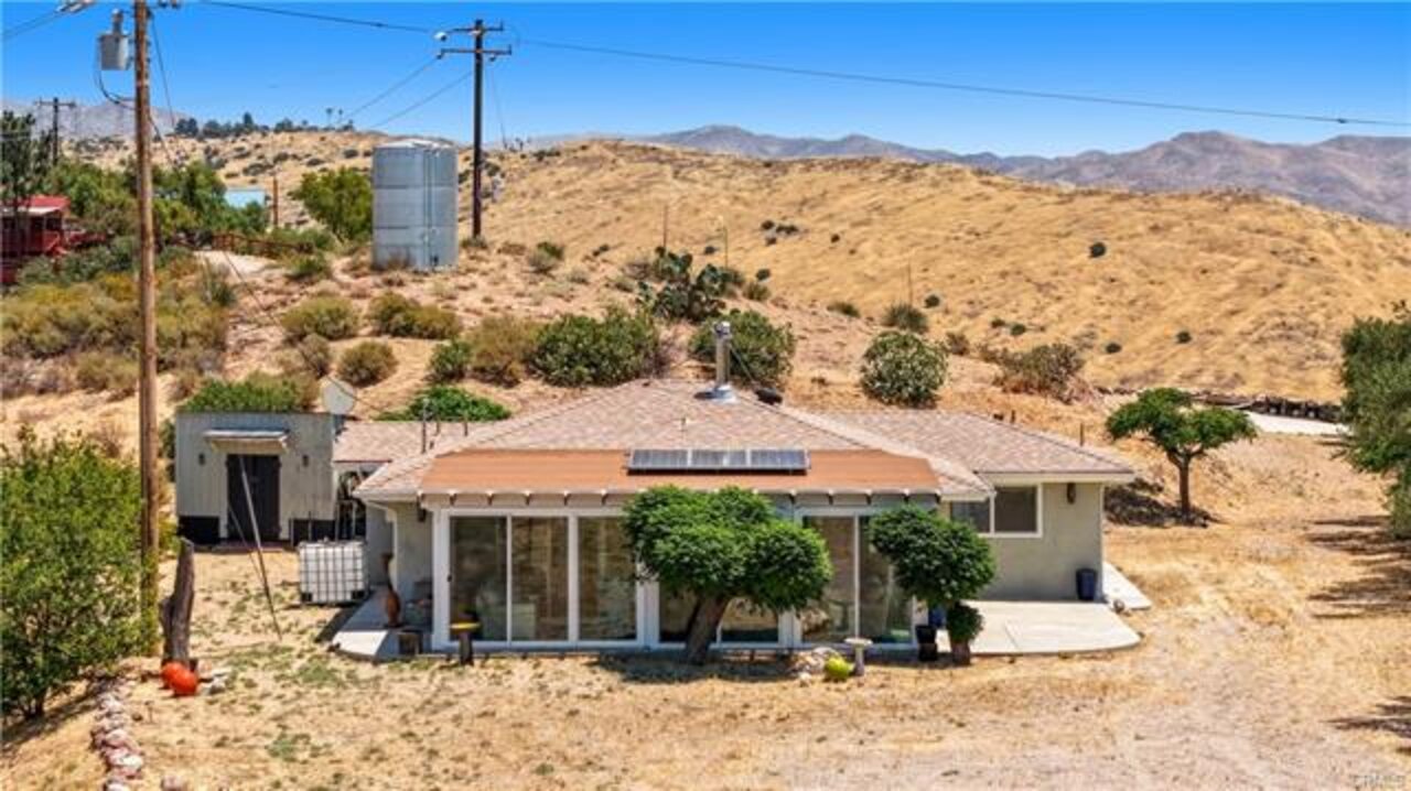 30668½ Tick Canyon Rd — off-grid hilltop cabin on 9.9 acres